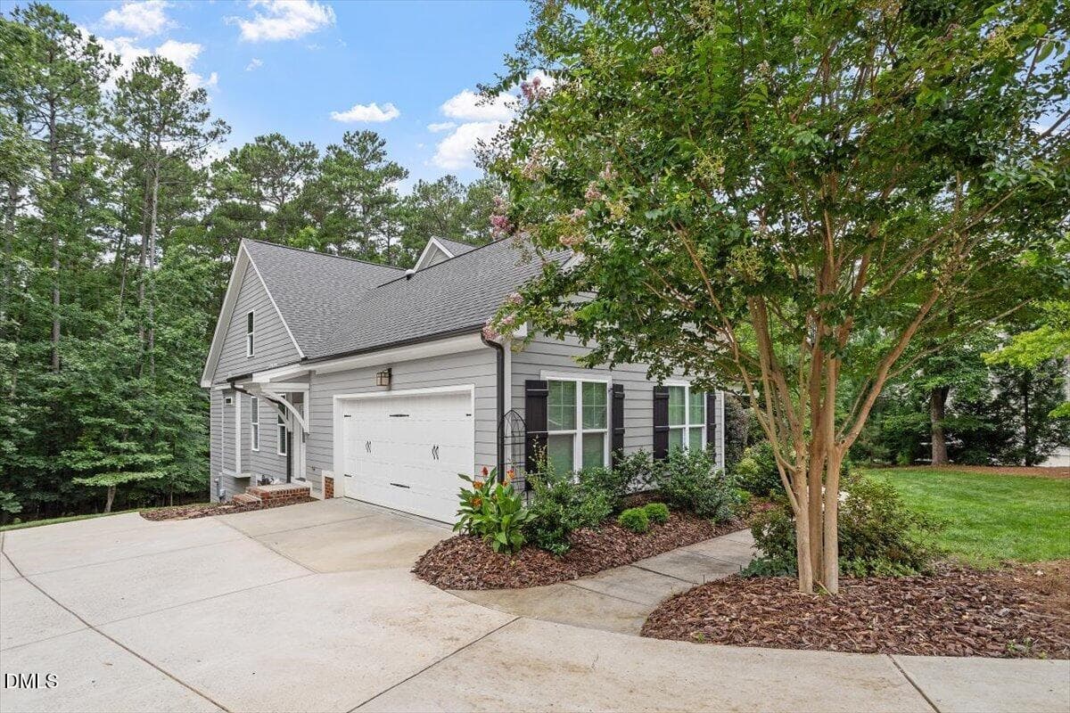 Two car garage, parking pad and concrete - 4235 Henderson Place, Pittsboro, NC 27312