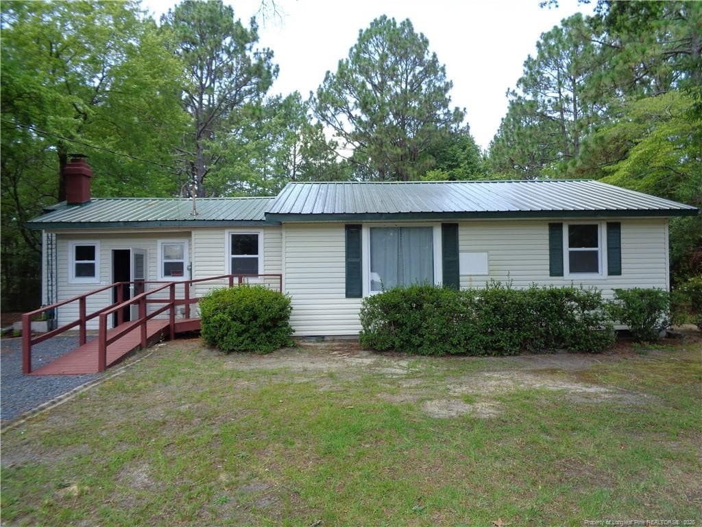 Photo 1 - 303 Archie Road, West End, NC 27376
