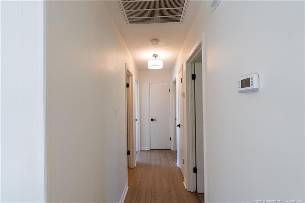 hall leading to bedrooms - 6603 Radcliff Ct Court, Fayetteville, NC 28311, Fayetteville