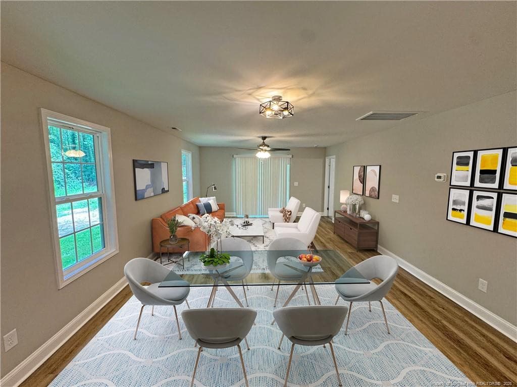 Virtually staged w/added furniture - 209 Robinson Street, Rockingham, NC 28379