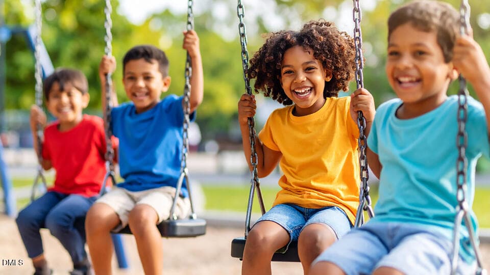 Laughing-Kids-on-Swingset - 512 Cherry Laurel Drive, Sanford, NC 27332