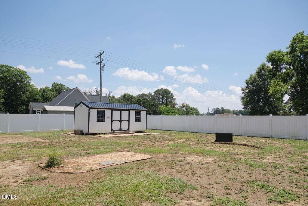 barn view outside to fence view - 1004 Butler Drive, Erwin, NC 28339
