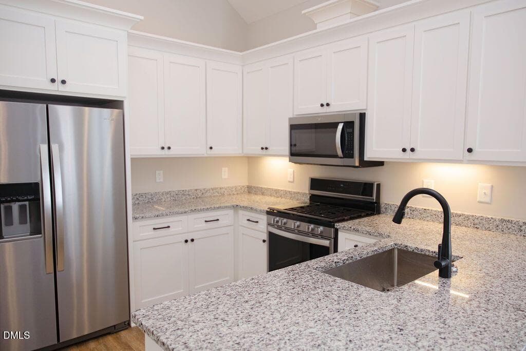 kitchen view 2 refrigerator - 1004 Butler Drive, Erwin, NC 28339