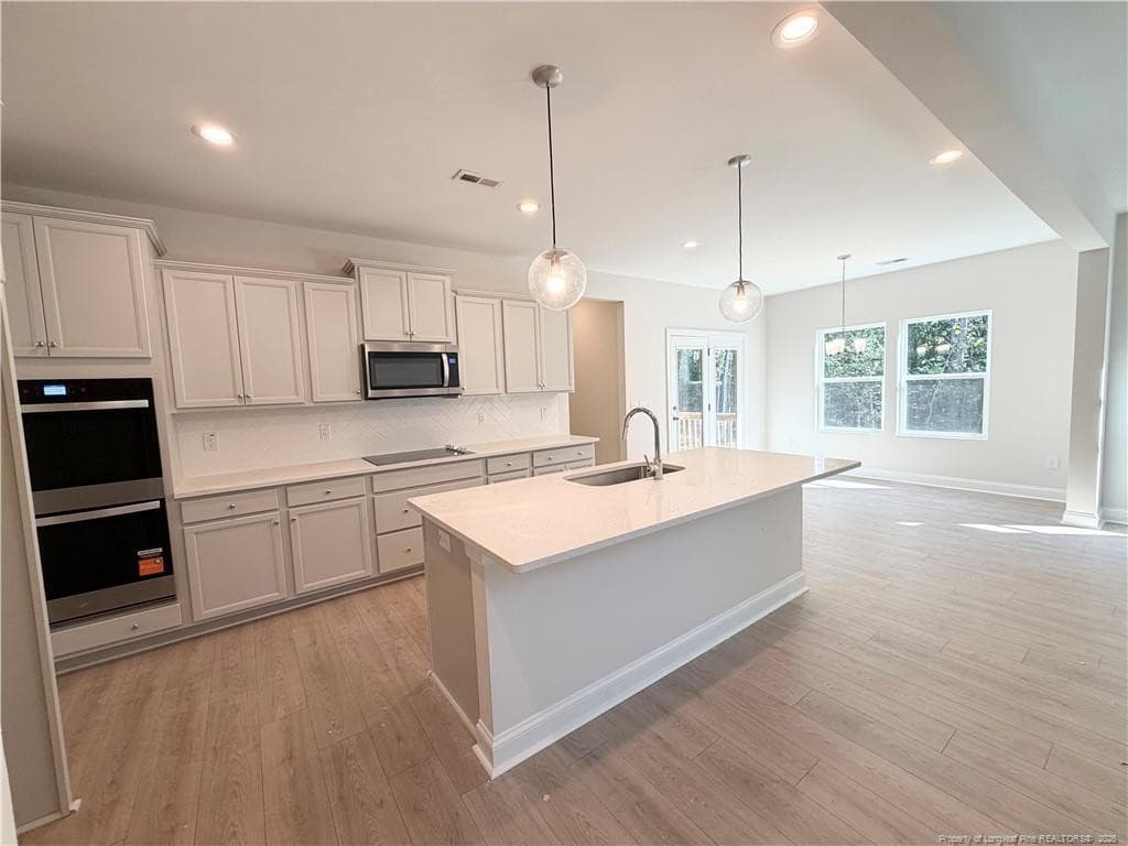 Photo 4 - 541 Grand Griffon Way, Lillington, NC 27546