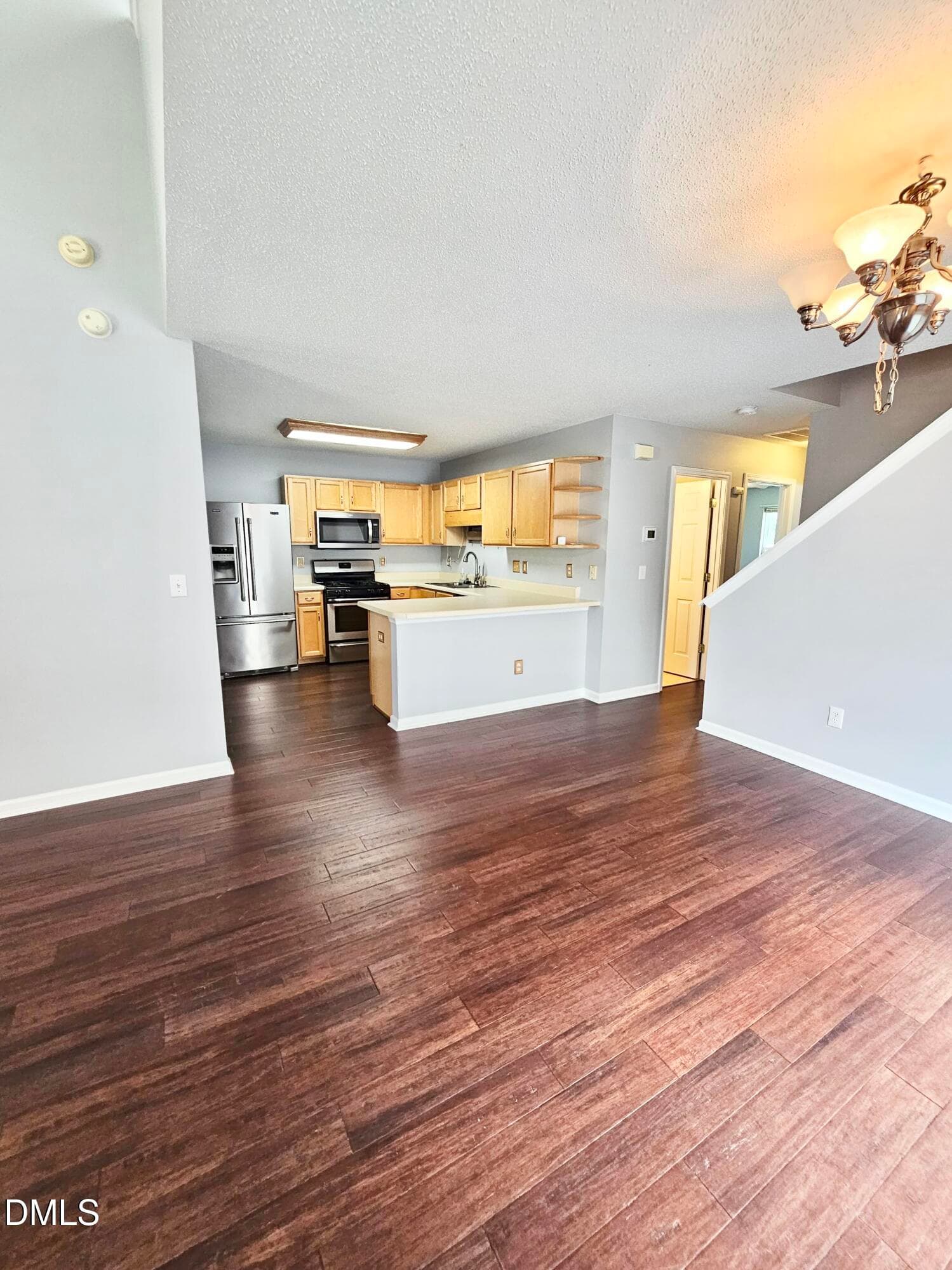 Kitchen from fireplace - 5428 Roan Mountain Place, Raleigh, NC 27613, Raleigh