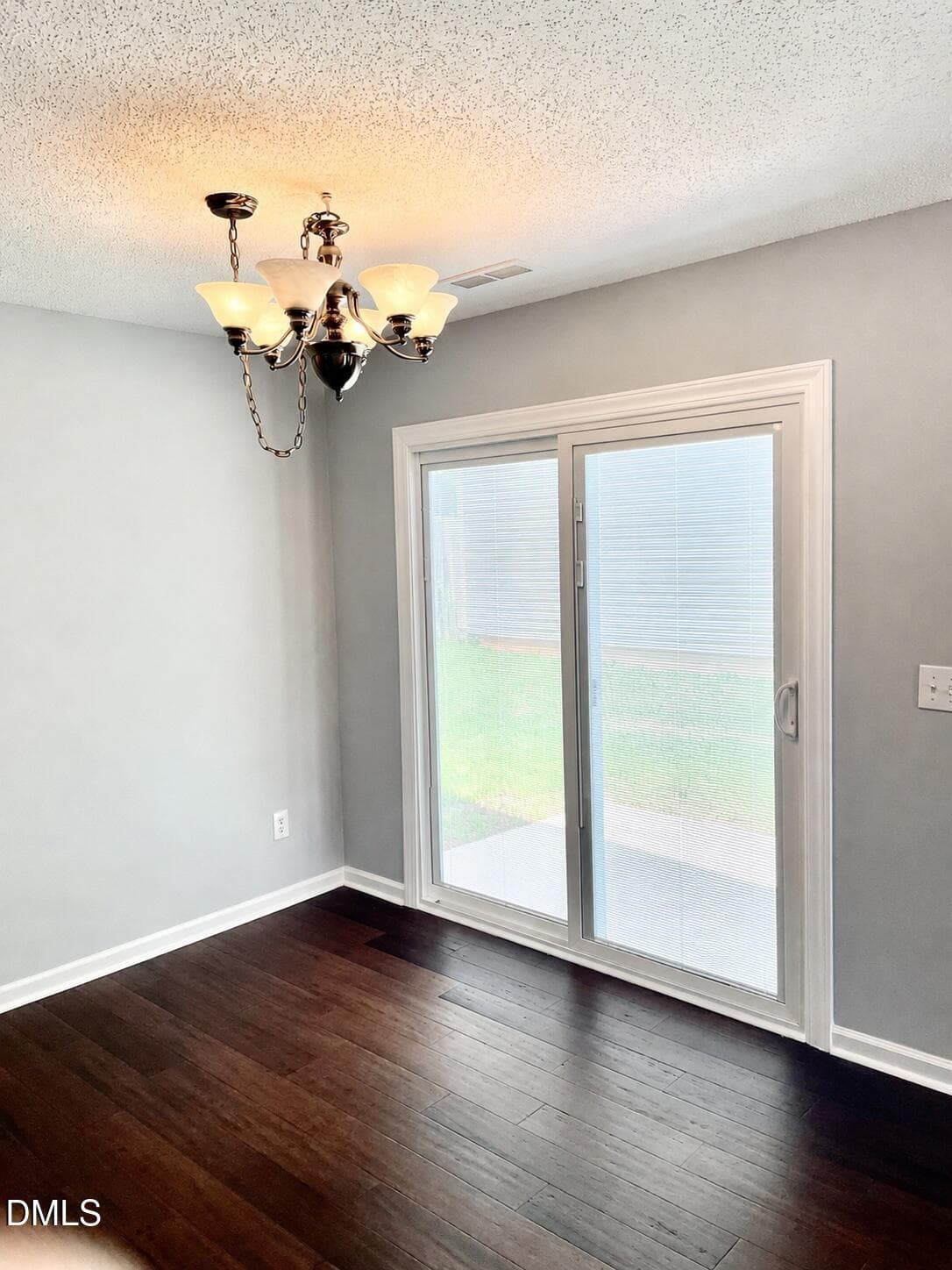 Sliding doors leading to patio - 5428 Roan Mountain Place, Raleigh, NC 27613, Raleigh