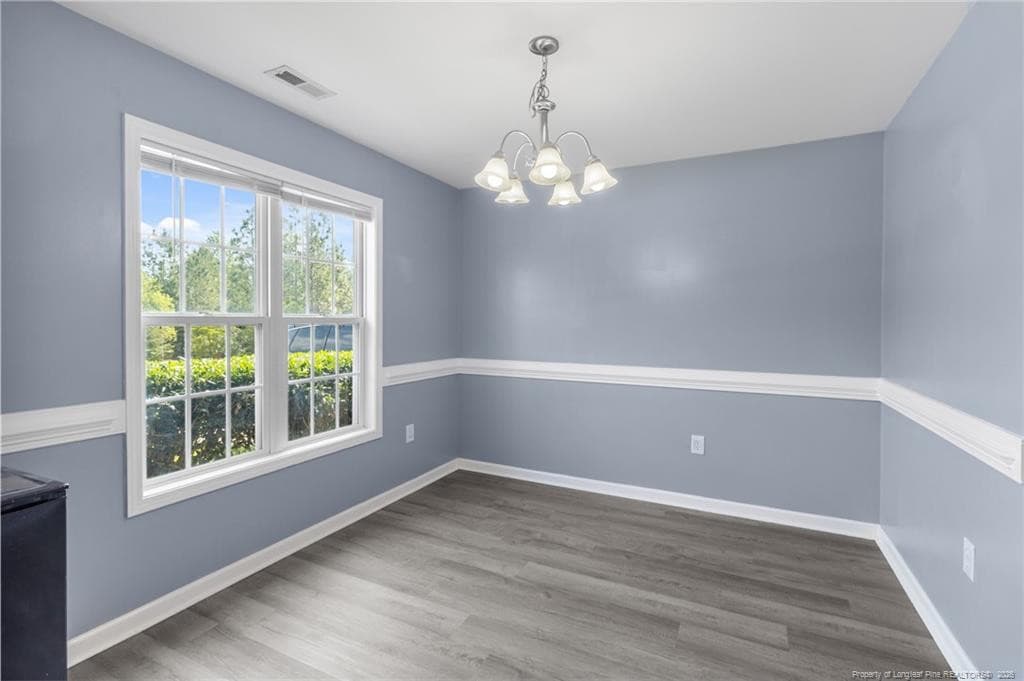 DR with chair railing - 80 Chinkapin Oak Circle, Bunnlevel, NC 28323