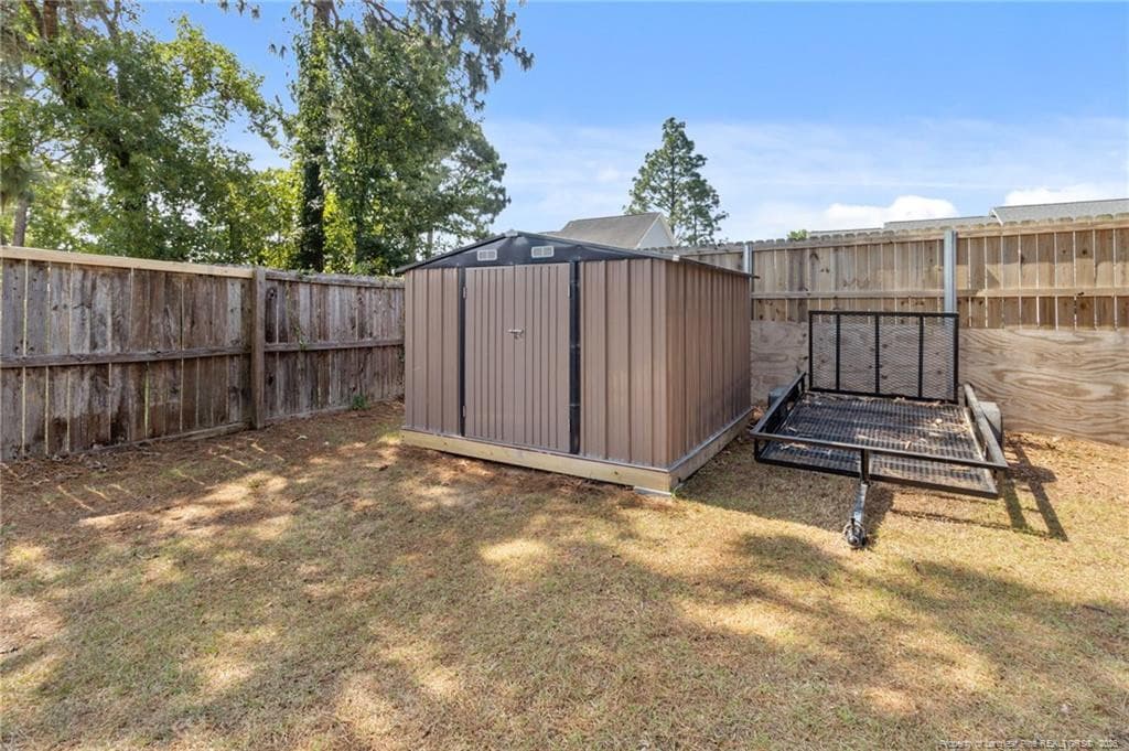 Shed conveys - 80 Chinkapin Oak Circle, Bunnlevel, NC 28323