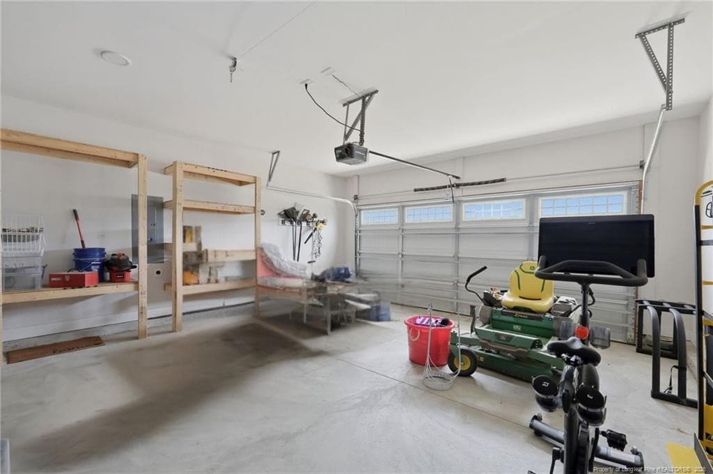 Large 2 car garage with built ins - 101 Woodford Lane, Vass, NC 28394