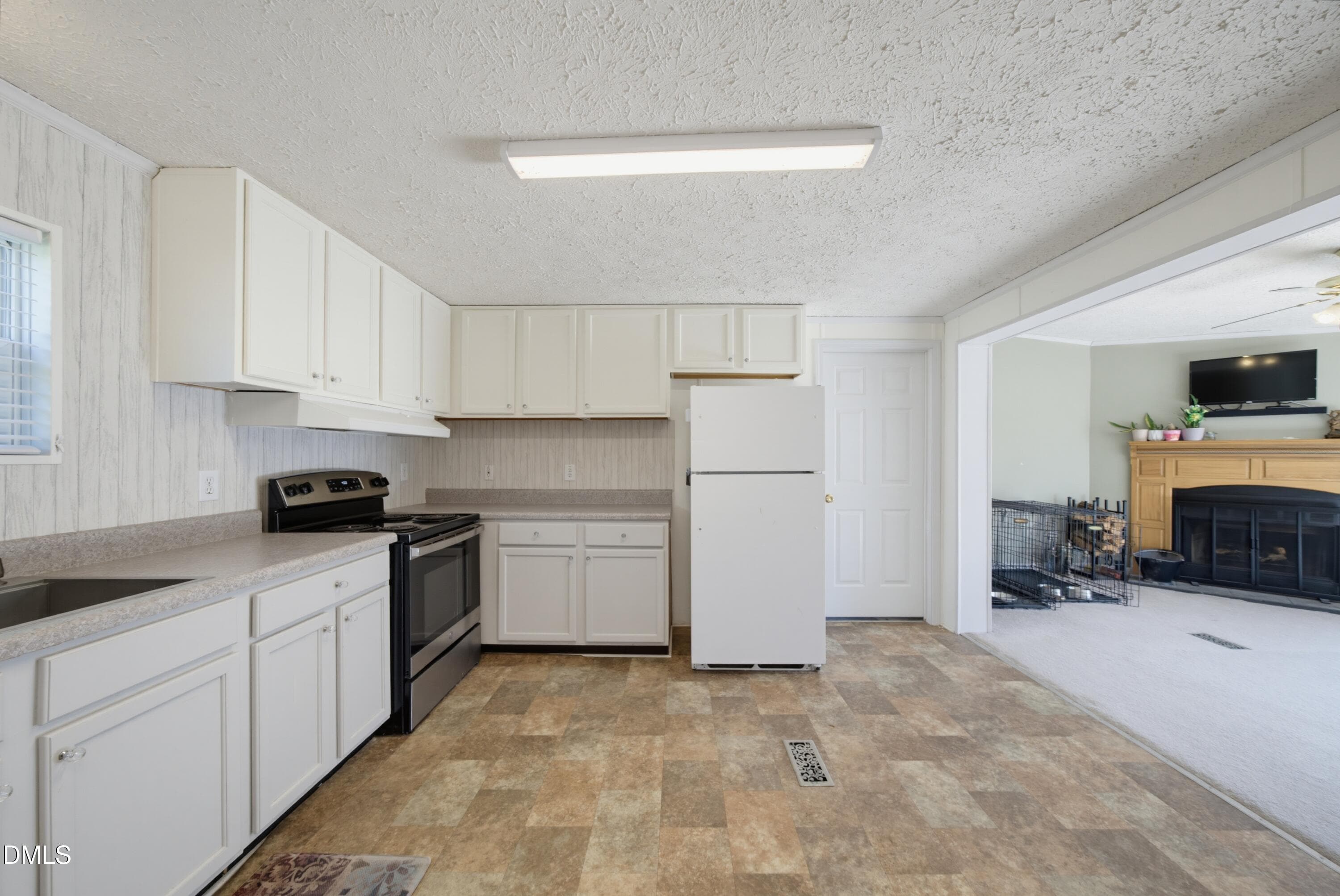kitchen and family - 523 County Line Road, Manson, NC 27553