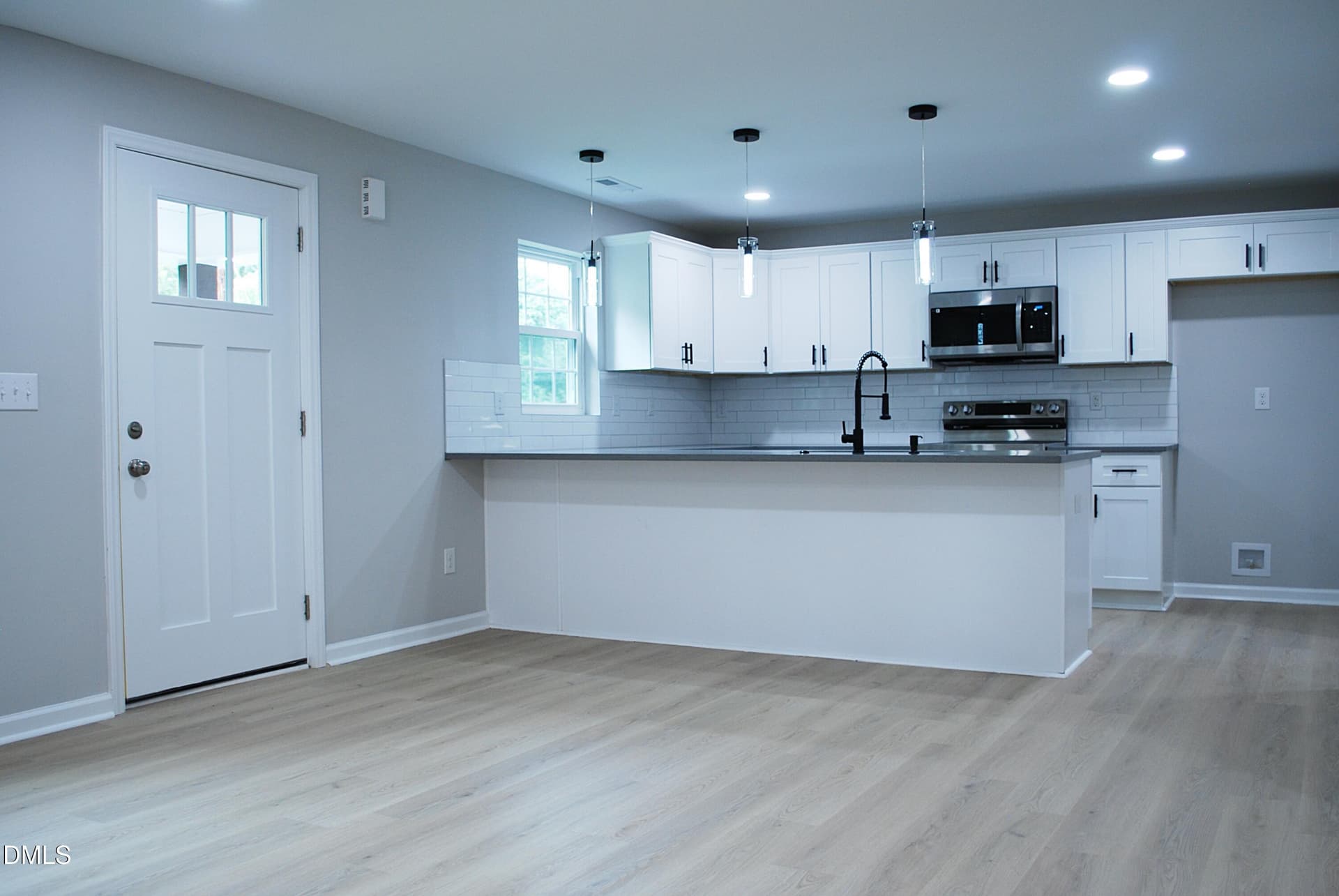 3 Living Room into Kitchen - 421 E Webb Street, Mebane, NC 27302
