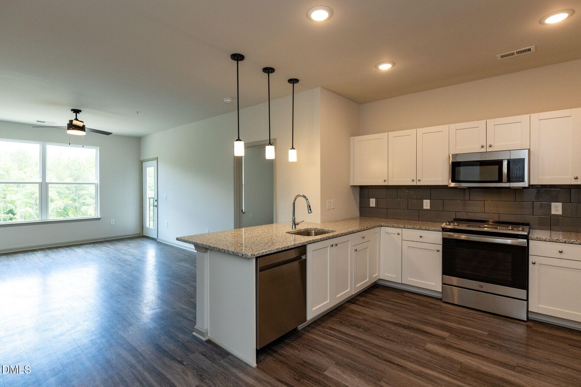 001-1920x1080-kitchen-family-room - 2418 Gathering Square Court, Fuquay Varina, NC 27526