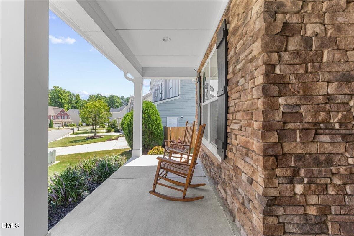 Rocking chair front porch - 819 Lake Artesia Lane, Fuquay Varina, NC 27526