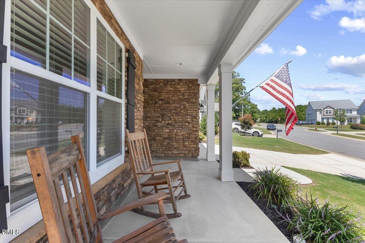 Rocking chair front porch - 819 Lake Artesia Lane, Fuquay Varina, NC 27526