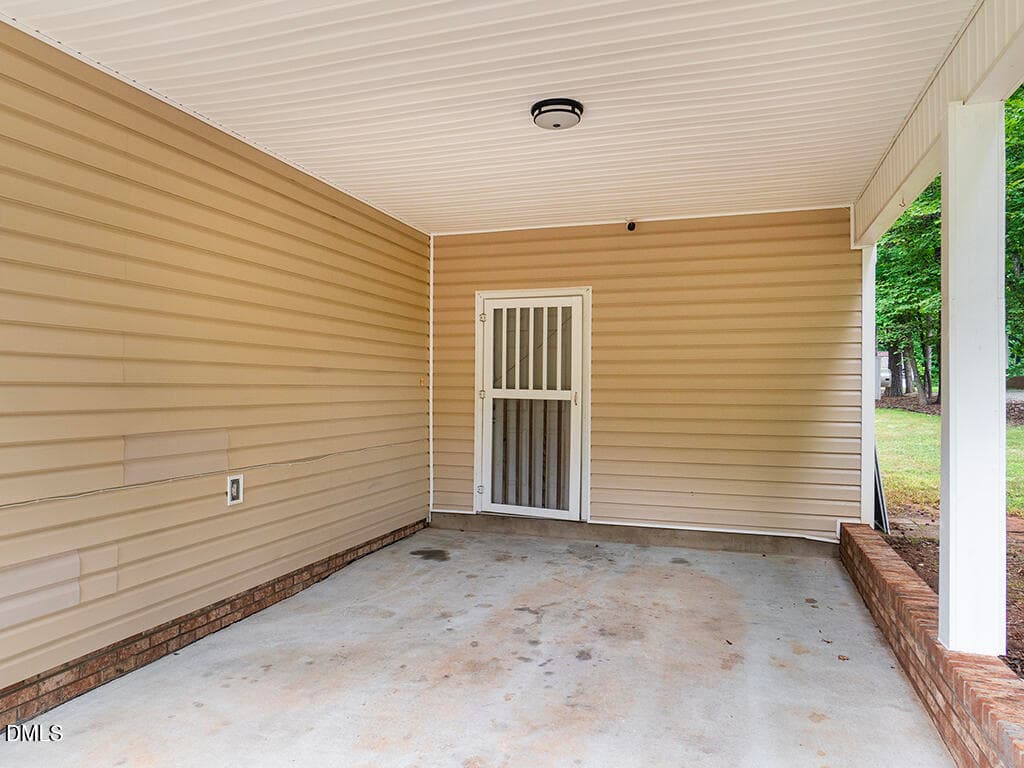 27 948_Gboro-CHRd Carport_MLS - 948 W Greensboro Chapel Hill Road, Snow Camp, NC 27349, Snow Camp