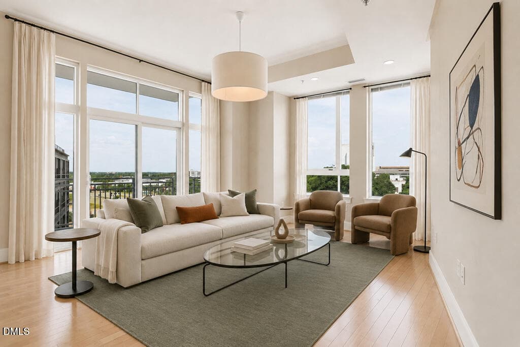 Living_Room - Virtually Staged - 400 W North Street 826, Raleigh, NC 27603, Raleigh