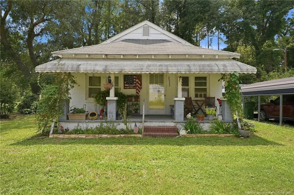 Photo 1 - 23780 Cotton Street, Wagram, NC 28396