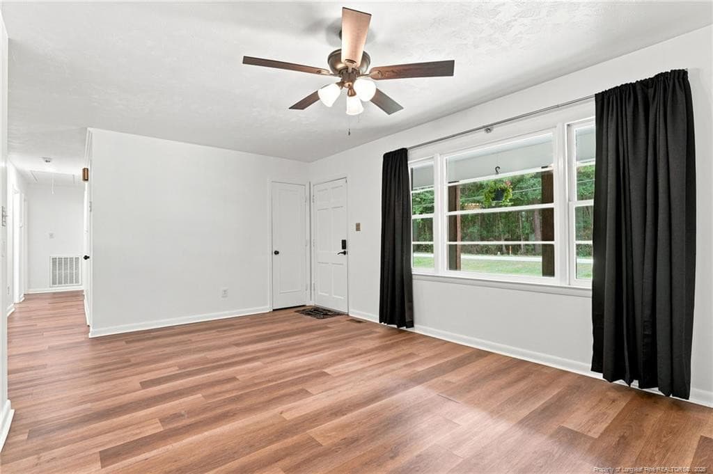 Entry and living room - 13280 Blues Farm Road, Laurinburg, NC 28396