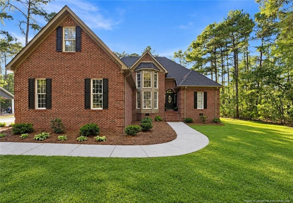 Photo 1 - 30000 Loblolly Court, Wagram, NC 28396