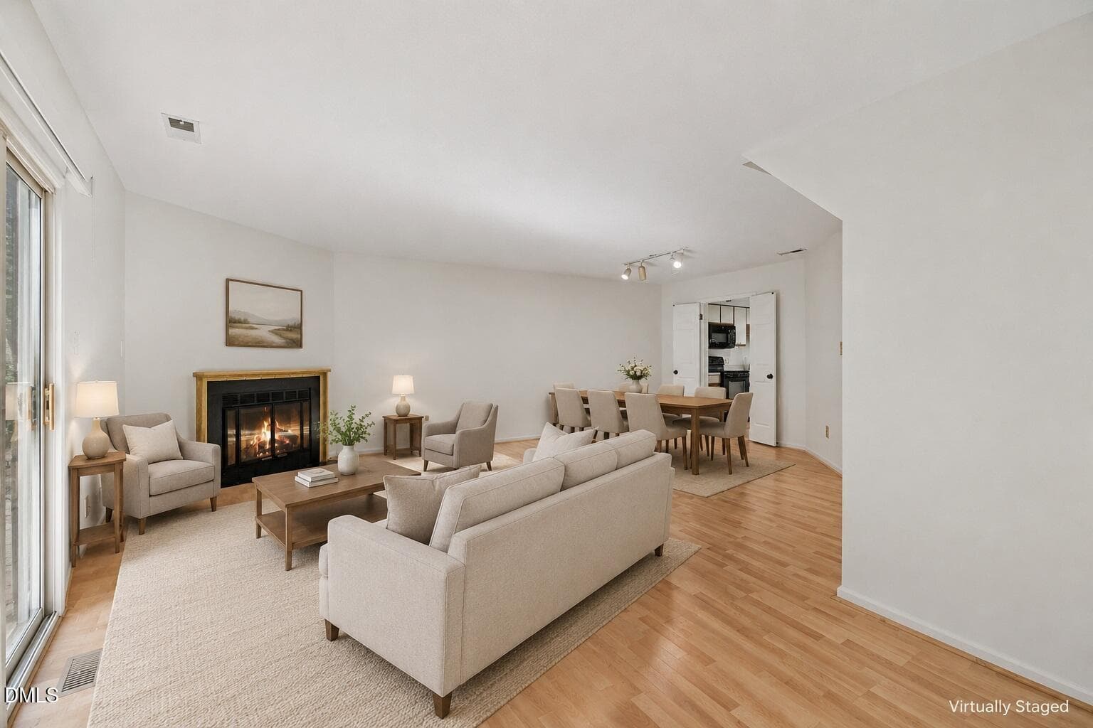 8 LR DR virtually staged - 109 Mossbark Lane, Chapel Hill, NC 27514