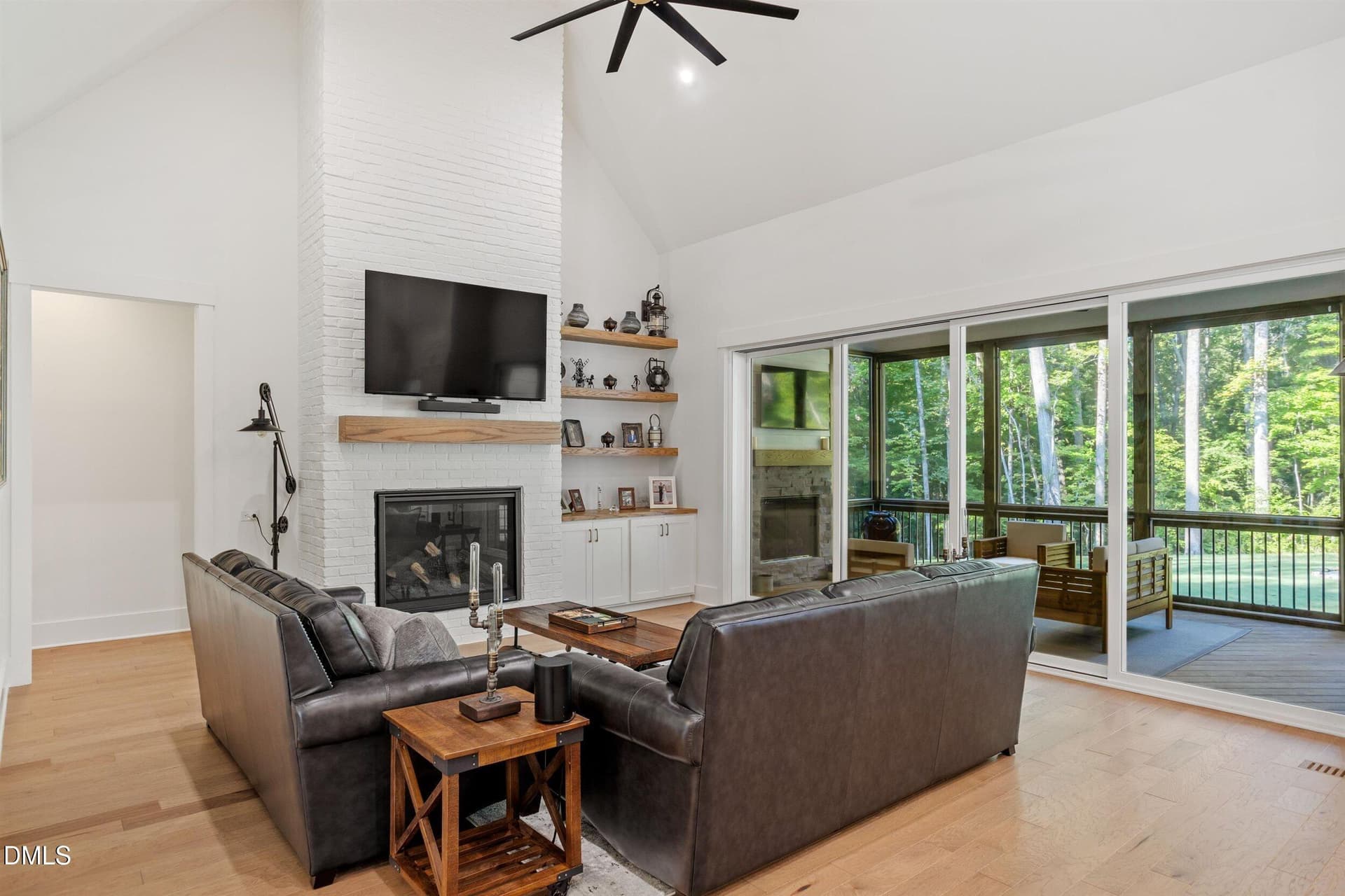 Family room overlooking screened porch - 160 Roberson Creek Road, Pittsboro, NC 27312