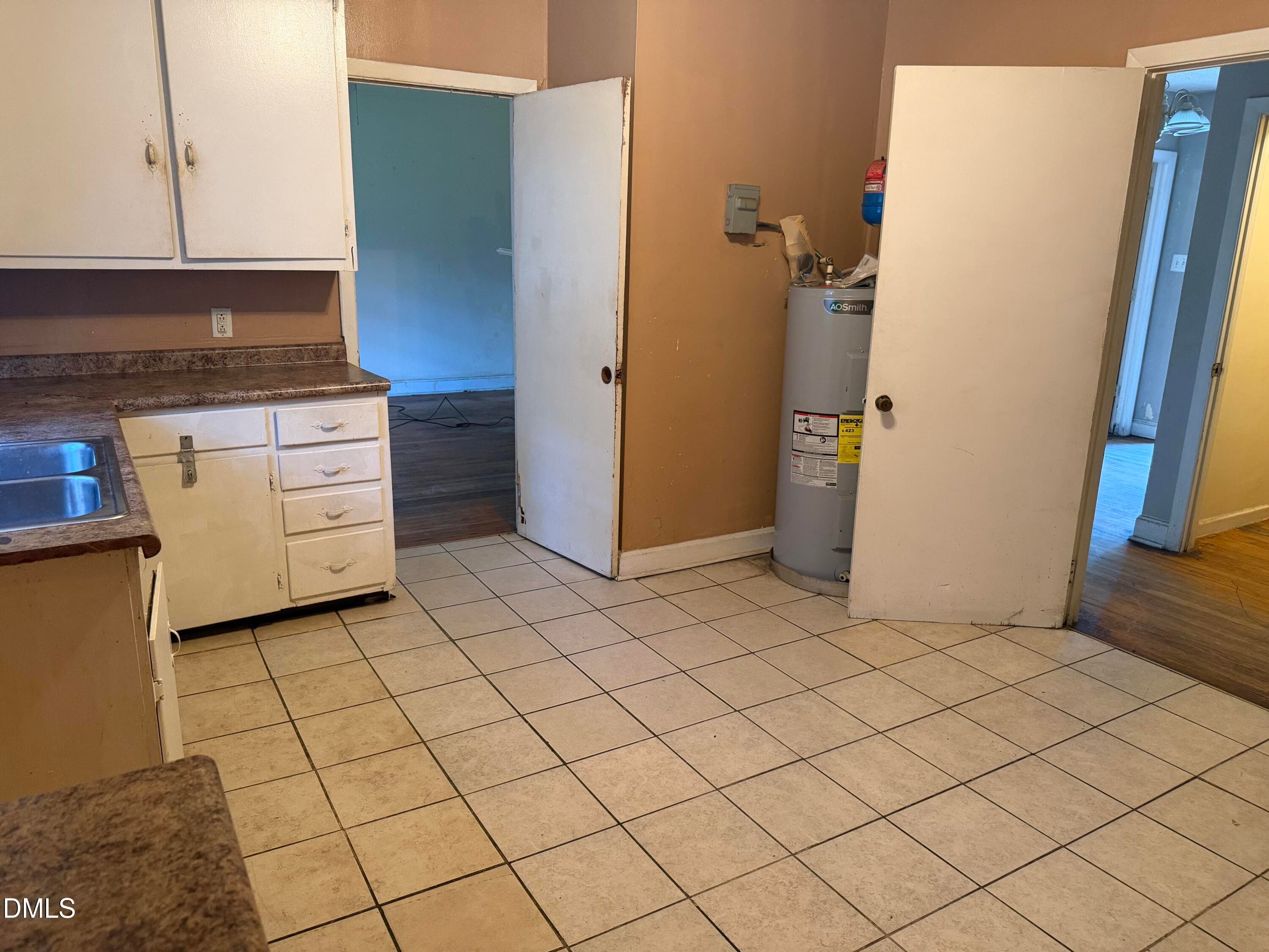 kitchen w water heater - 645 Sunnybrook Road, Raleigh, NC 27610