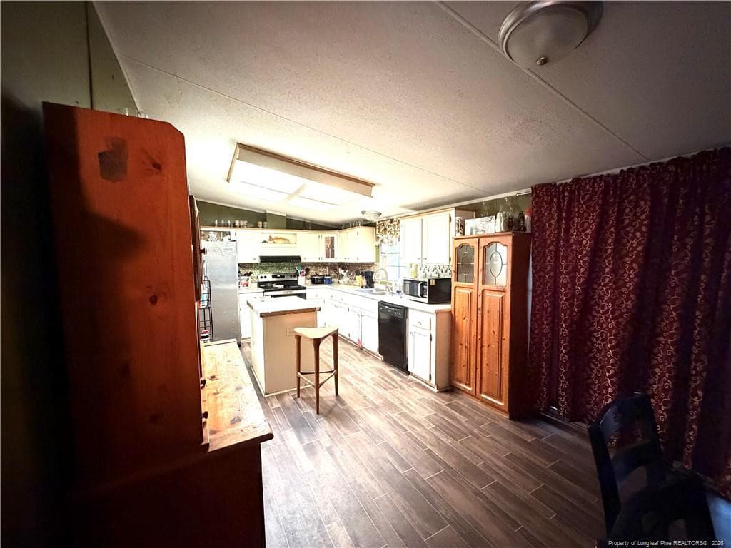 kitchen from dining area - 15041 Smith Road, Gibson, NC 28343