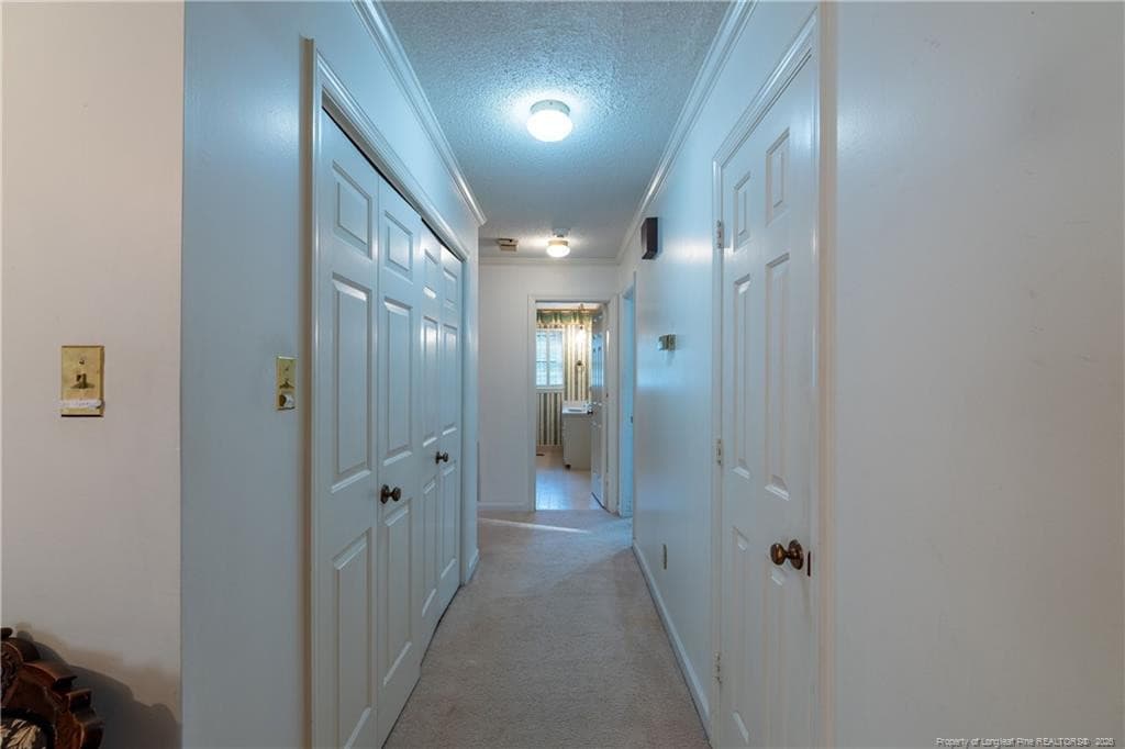 Hall leading to bathroom and bedrooms - 1813 Purdue Drive, Fayetteville, NC 28304, Fayetteville