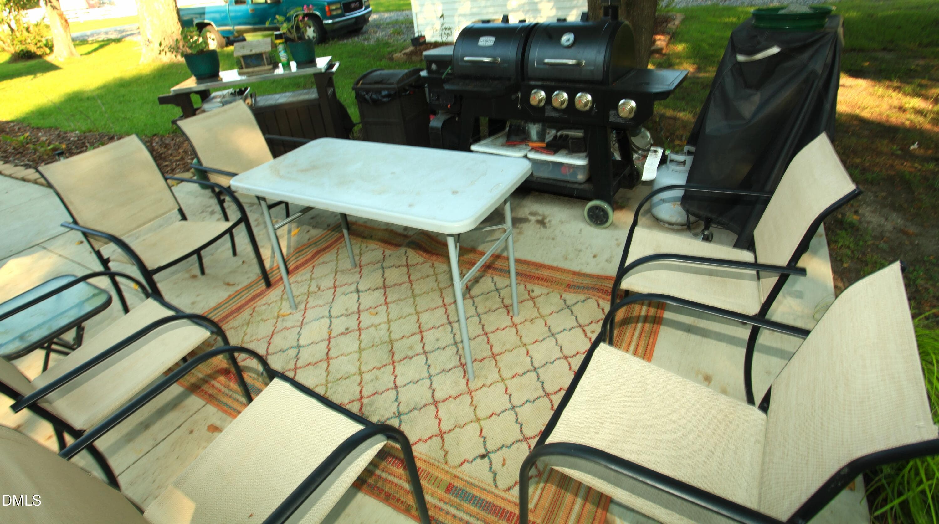 BBQ patio and chairs - 2351 Mount Pleasant Road, Willow Springs, NC 27592, Willow Springs