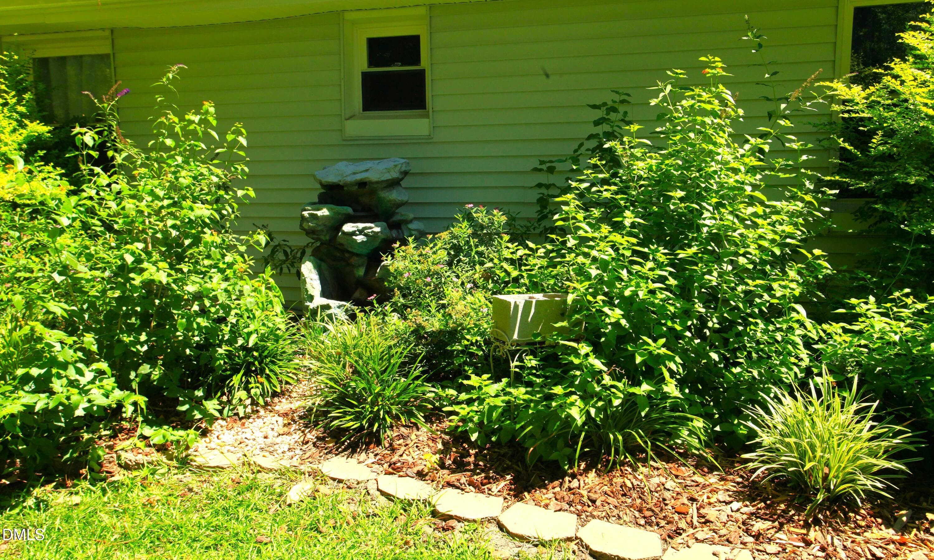 Water fountain and butterfly plants - 2351 Mount Pleasant Road, Willow Springs, NC 27592, Willow Springs