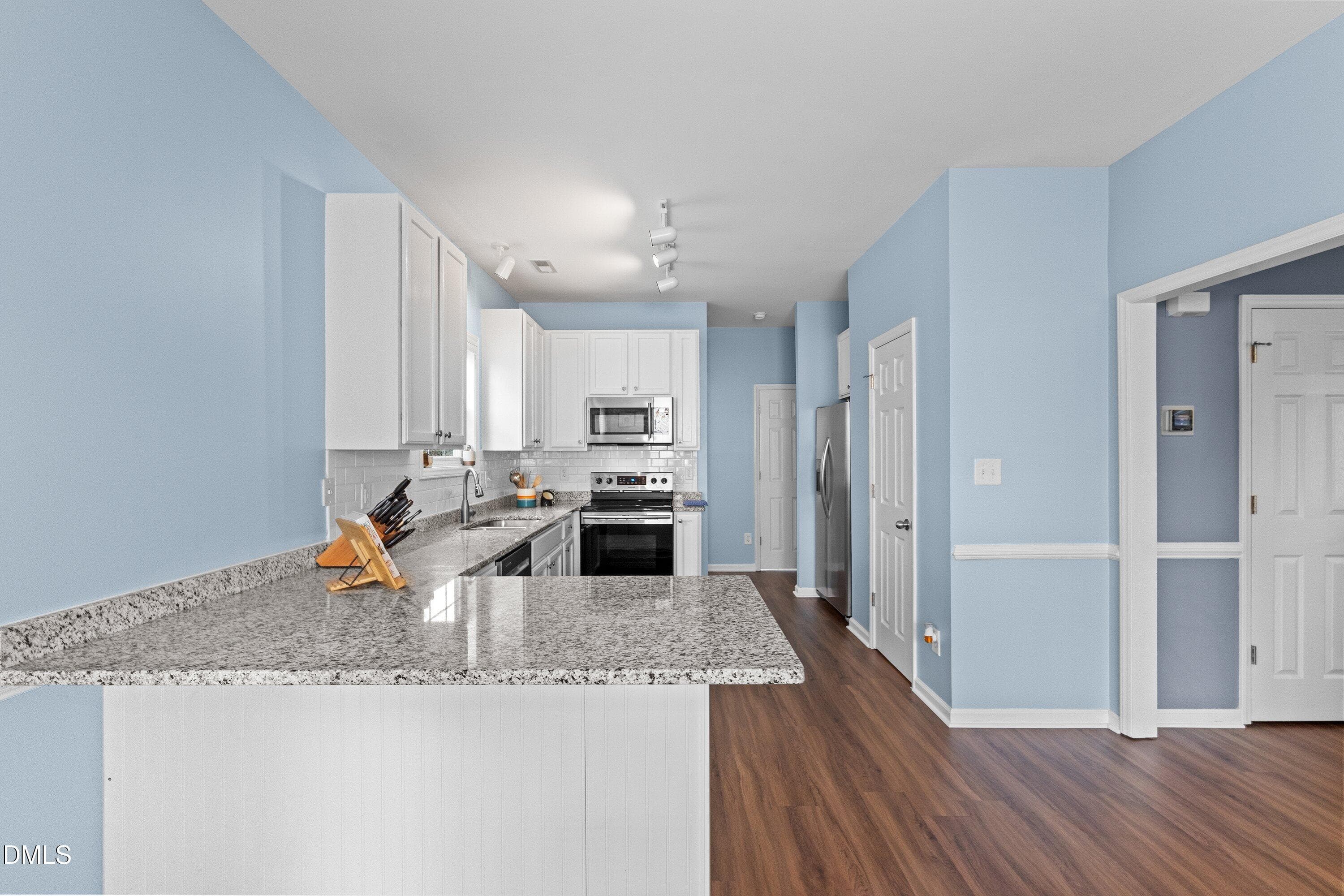 Spacious kitchen-LVP floors - 107 Stoney Drive, Durham, NC 27703, Durham