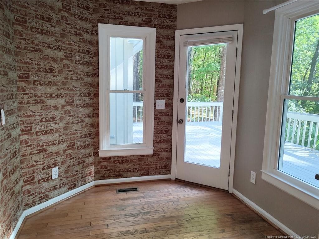 Breakfast nook leading out to deck - 1455 Carolina Drive, Sanford, NC 27332