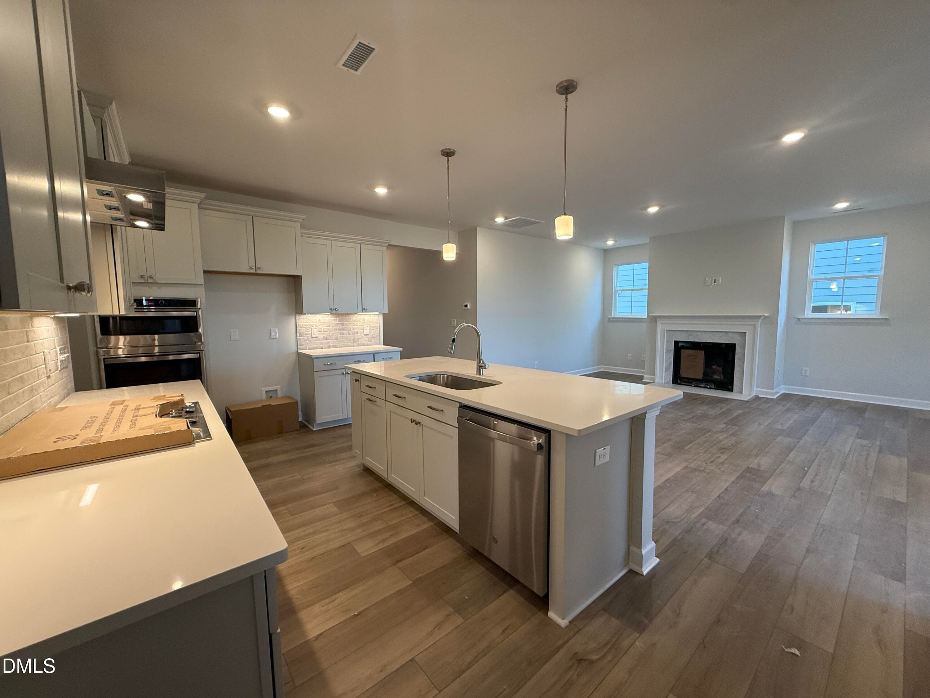 Kitchen, Island, Fireplace in Great Room - 2056 Bull City Bend 372, Durham, NC 27703, Durham