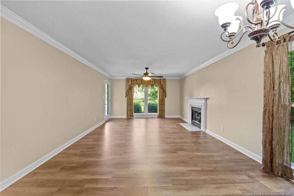 Living room/Formal dining area - 300 Ayrshire Court, Fayetteville, NC 28311, Fayetteville