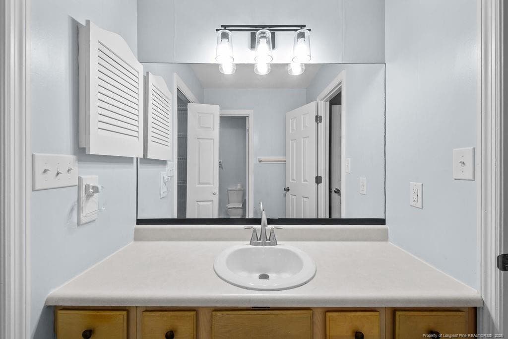 Master bath vanity area - 300 Ayrshire Court, Fayetteville, NC 28311, Fayetteville