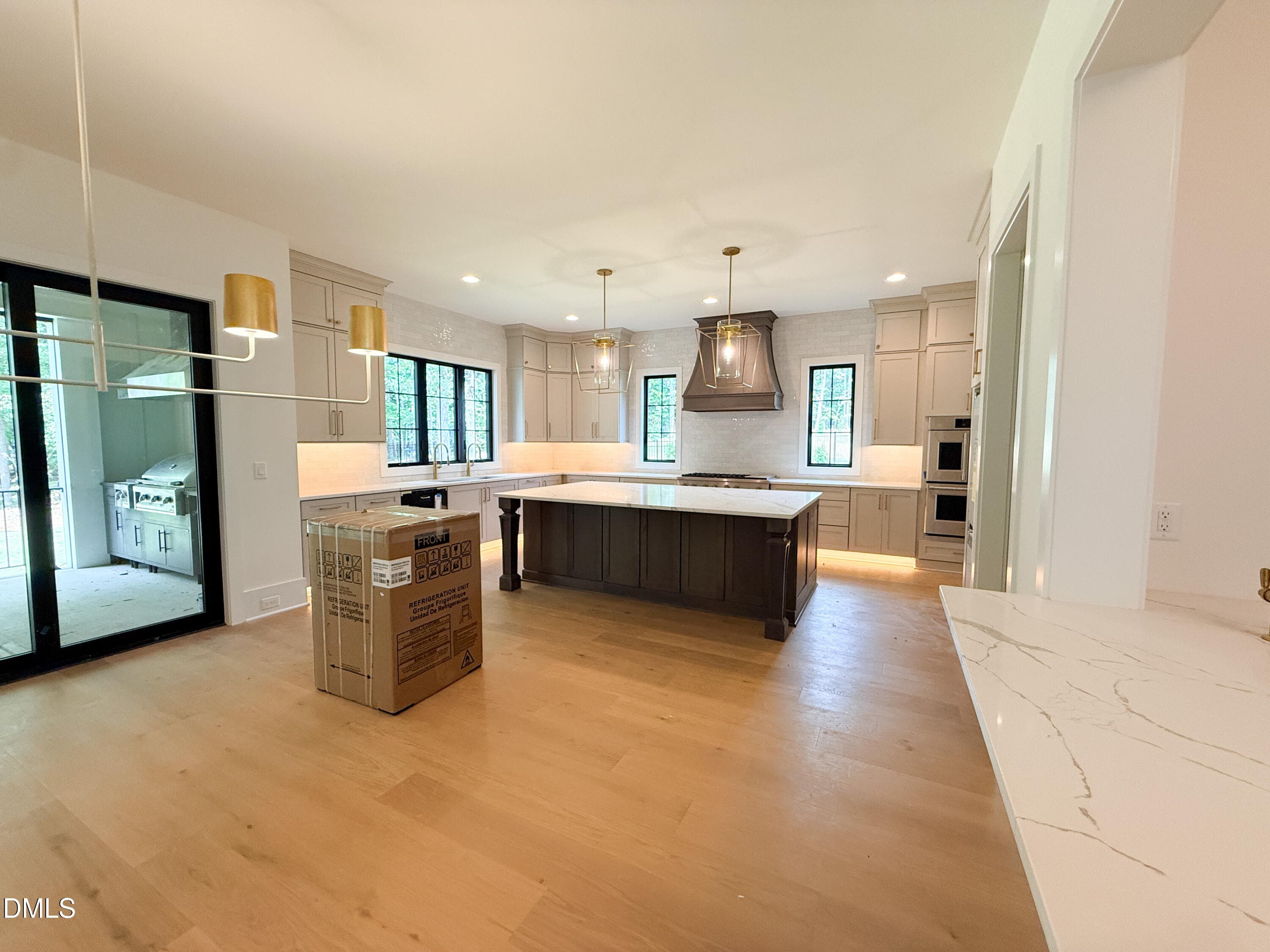 10 - Kitchen with Abundant Lighting-2 - 5904 Leone Pride Circle, Raleigh, NC 27603, Raleigh