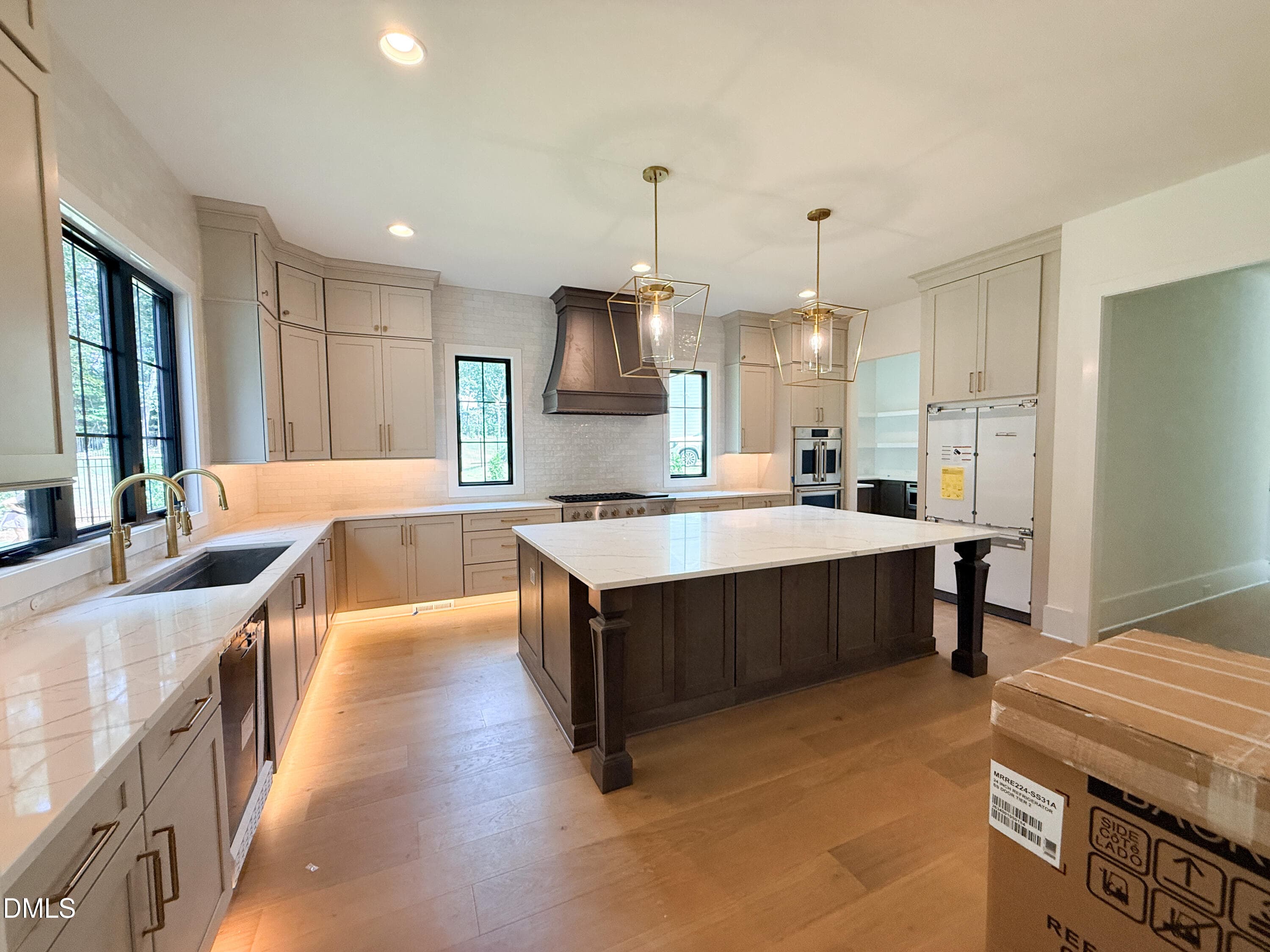 11 - Kitchen with Cabinets to the Ceilin - 5904 Leone Pride Circle, Raleigh, NC 27603, Raleigh