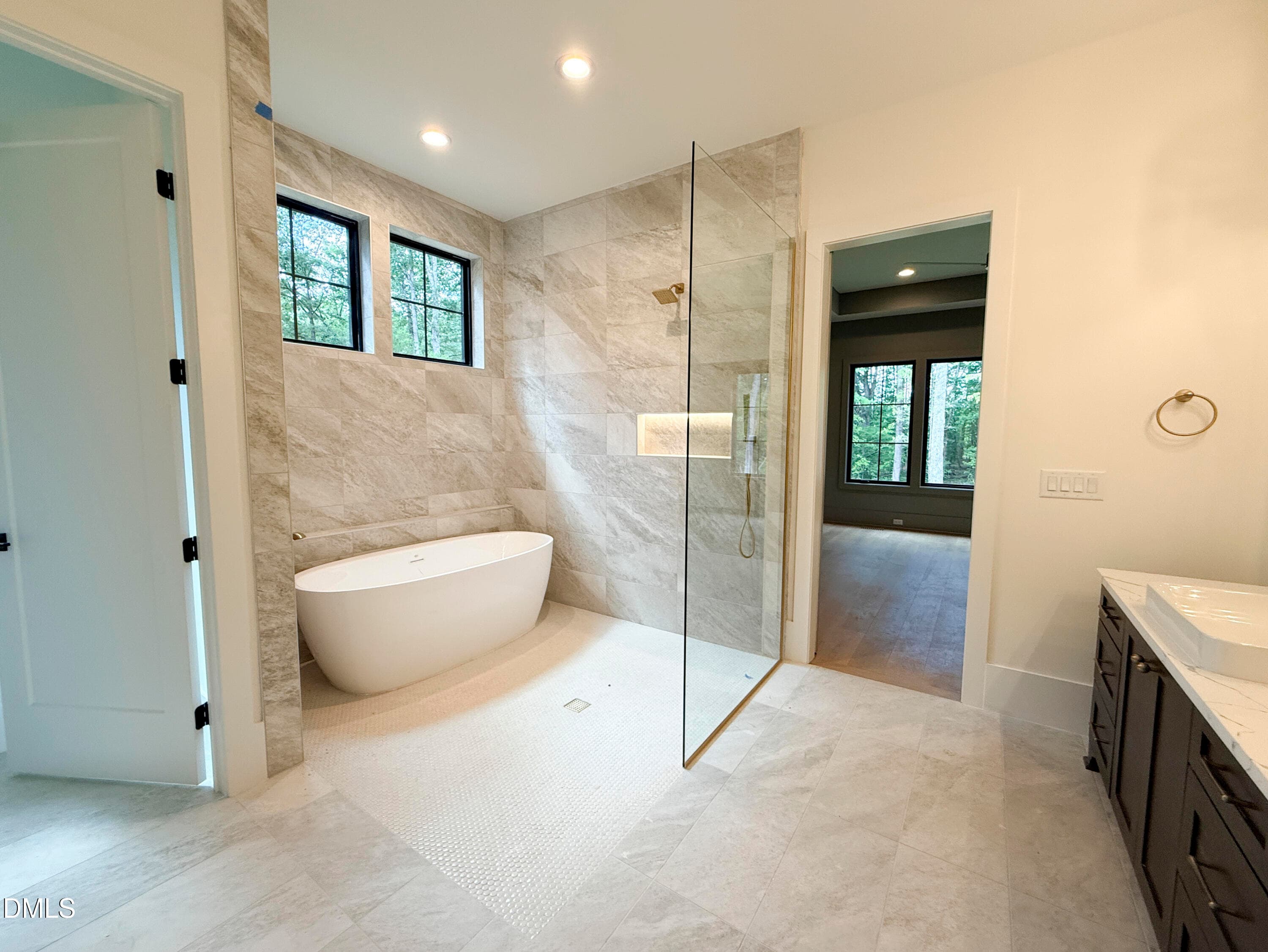 28 - Primary Bathroom with Light in Nich - 5904 Leone Pride Circle, Raleigh, NC 27603, Raleigh