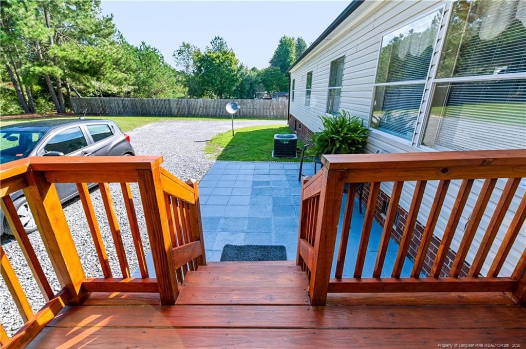 Deck view to patio - 1919 Pumping Station Road, Sanford, NC 27330