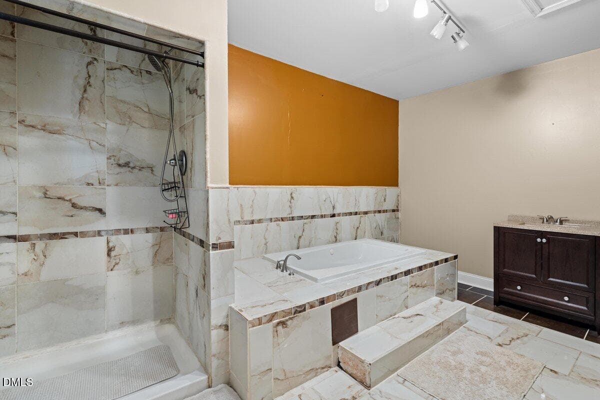 Primary Bathroom side view tub shower - 2605 Holloway Street, Durham, NC 27703