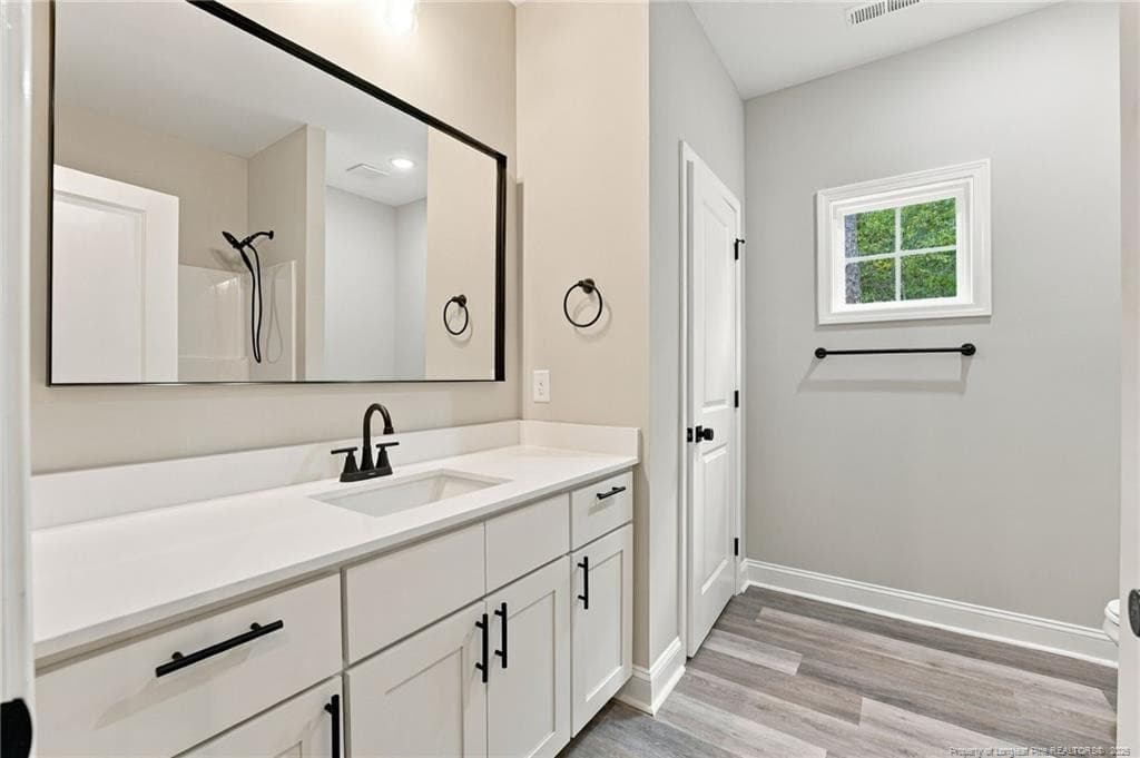 Full bath hall with linen closet - 26820 Peach Orchard Road, Wagram, NC 28396
