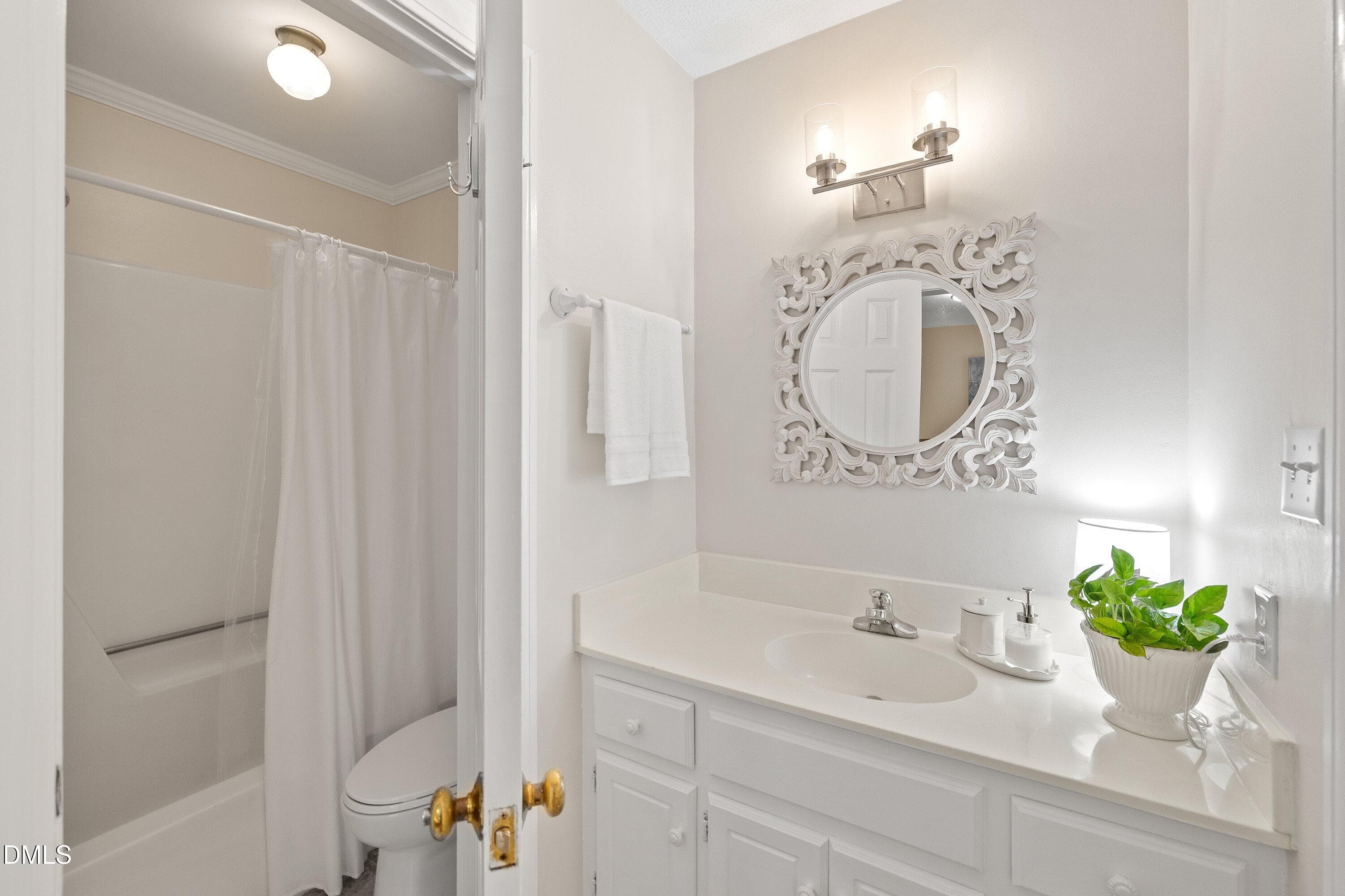 Bright and cheerful bath - 129 Hedgerow Court, Cary, NC 27513