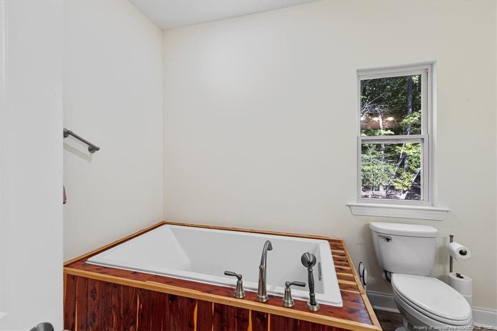 cedar wrap garden tub - 150 Horseshoe Hill Lane, Carthage, NC 28327