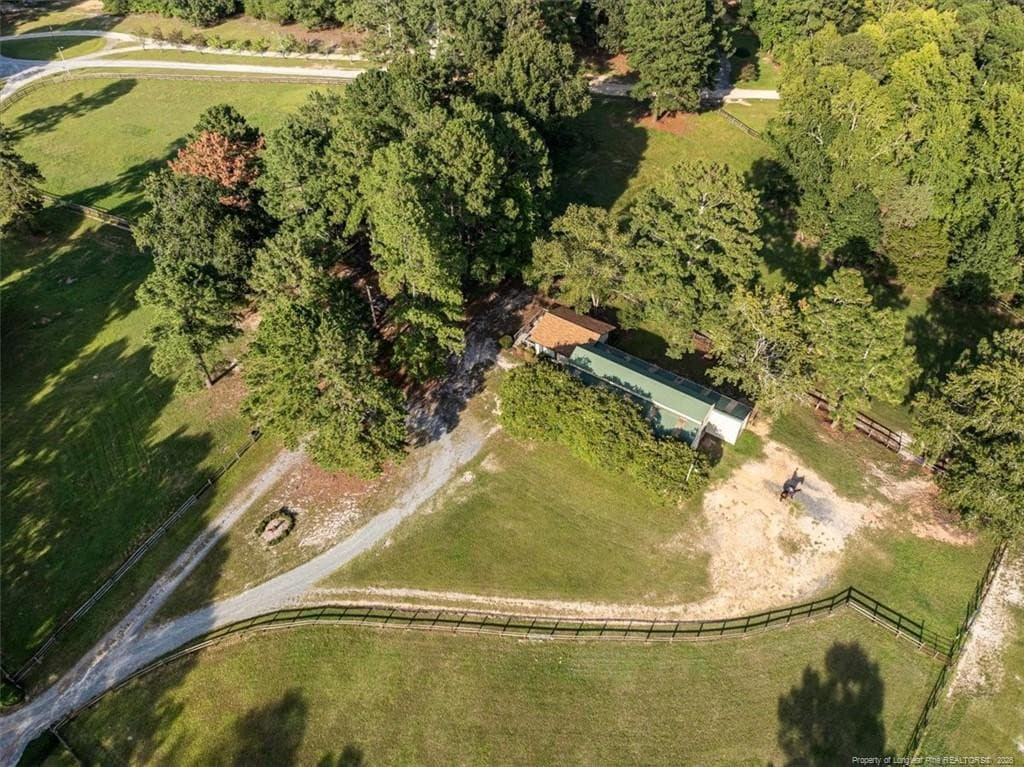 clubhouse and stables - 150 Horseshoe Hill Lane, Carthage, NC 28327