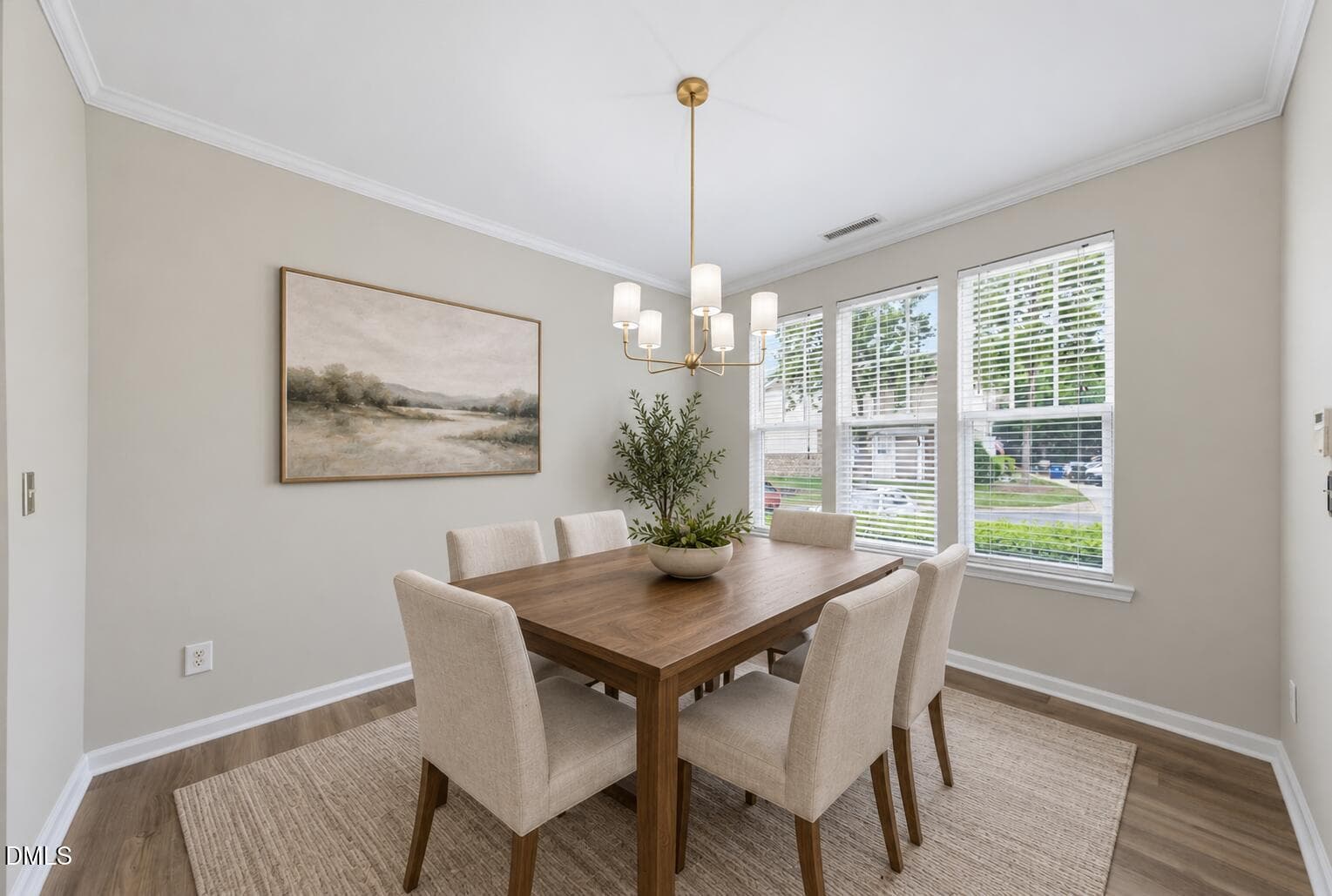 staged dining room - 6029 History Trail, Raleigh, NC 27612