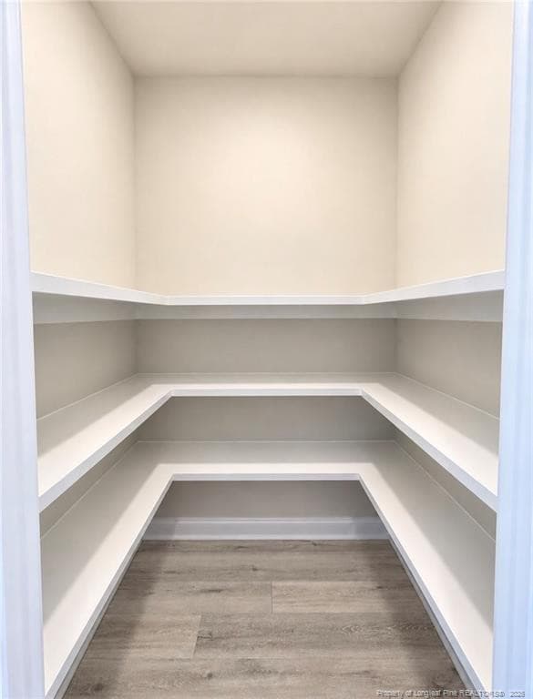 pantry with wooden shelves - 4745 Slew Drive, Hope Mills, NC 28348