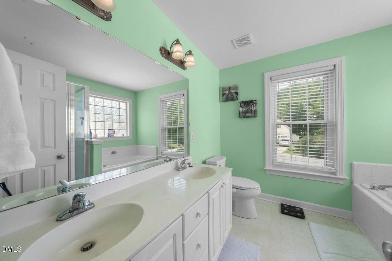 Primary w/double sink vanity - 5609 Paces Ferry Drive, Durham, NC 27712
