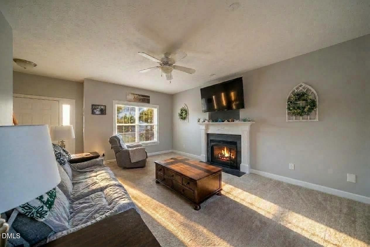 Spacious living room with fireplace - 5609 Paces Ferry Drive, Durham, NC 27712