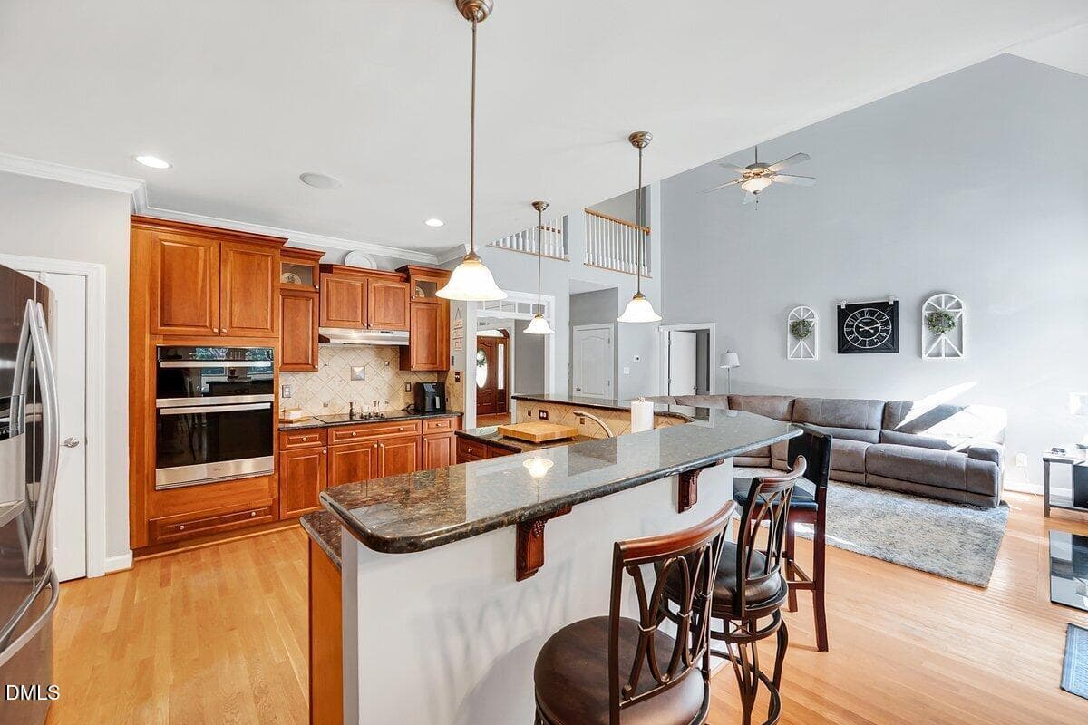 Kitchen to family room - 1200 Chipper Lane, Wake Forest, NC 27587