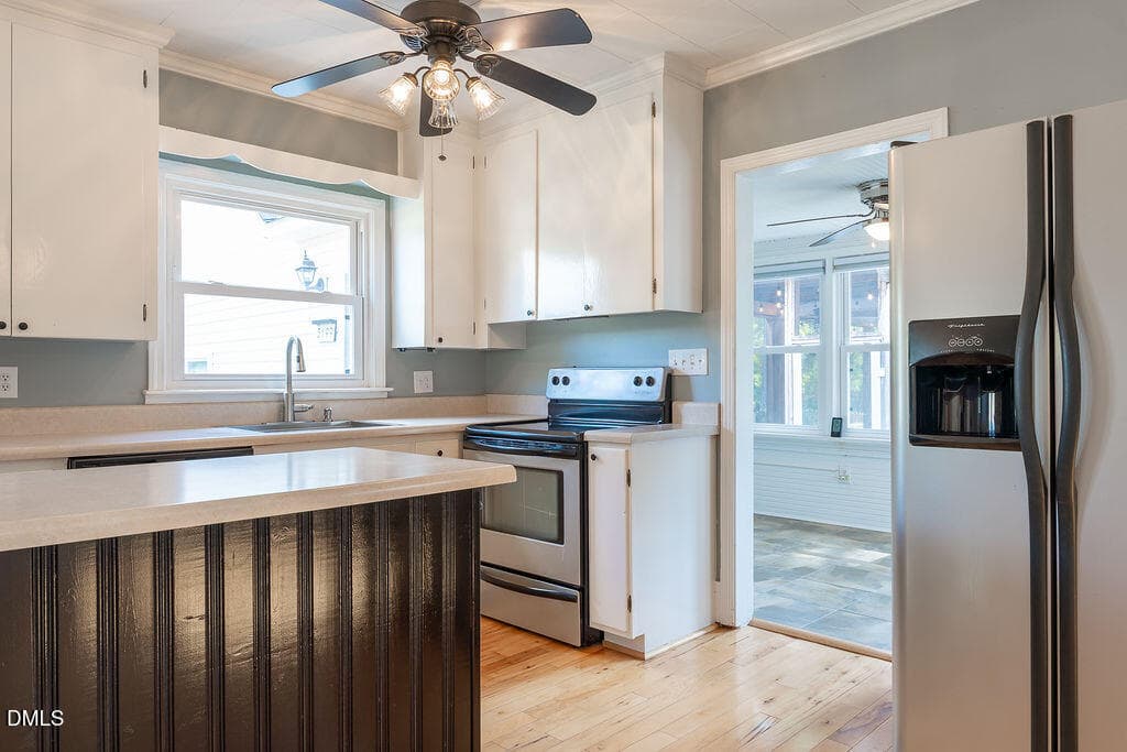 Kitchen Leads to Sunroom - 3199 Nc-55, Coats, NC 27521